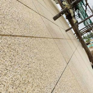 防城港 黄金麻花岗岩荔枝面外墙干挂石材效果示例