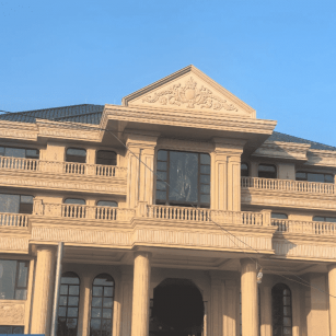 防城港黄金麻别墅外墙干挂石材效果示例